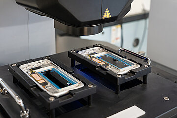 Mobile phones being produced in a factory